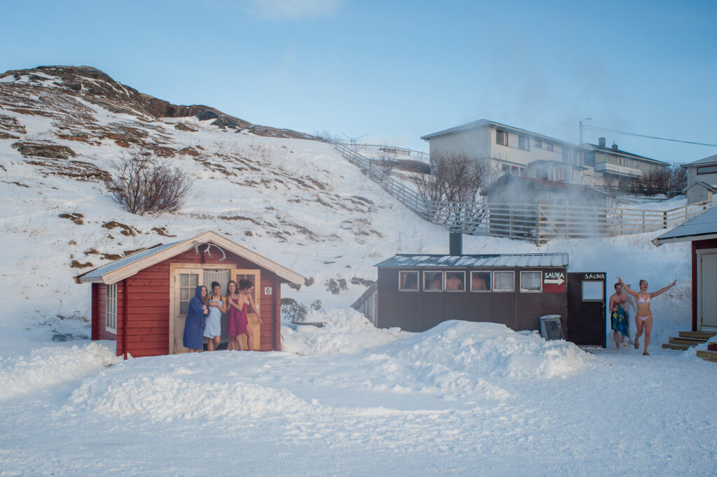 group of people infront of the sauna