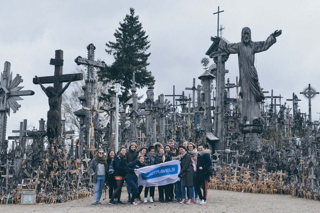 a group of people in front of Hill of Cross, Lithuania