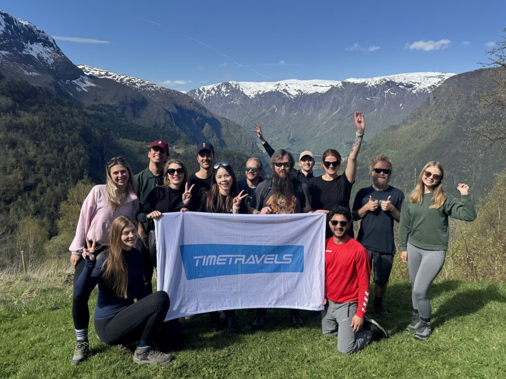 group of people in front of Norway mountain
