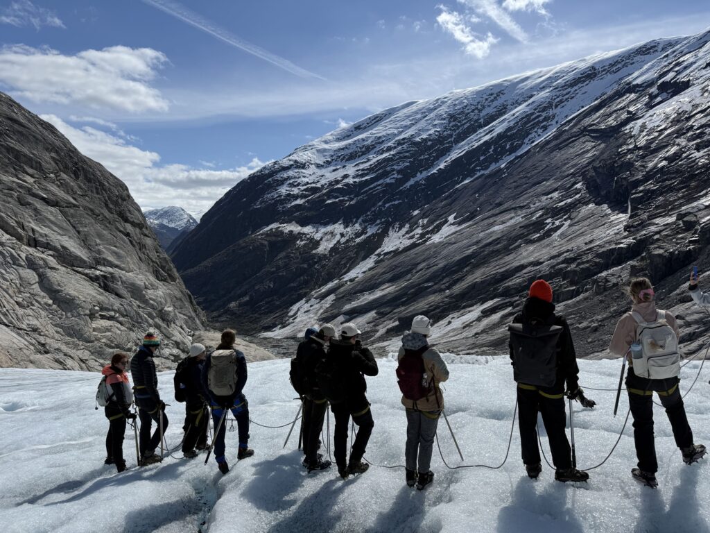 a group of people doing glacier hike