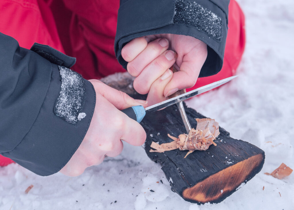 a photo of fire making process